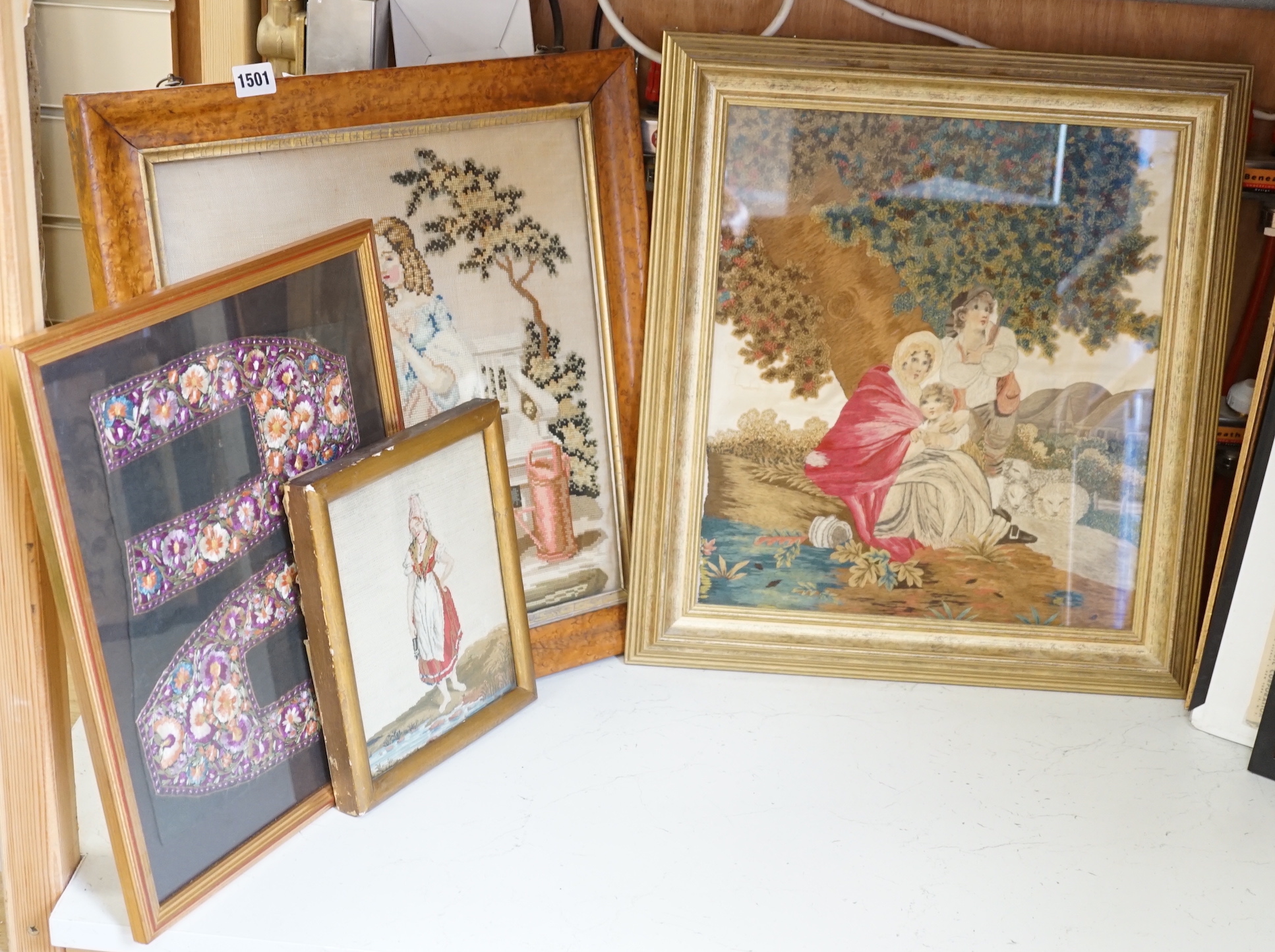 A framed Regency embroidery, two later figurative embroideries and a pair of embroidered slipper fronts, Regency embroidery 37cm wide, 41cm high